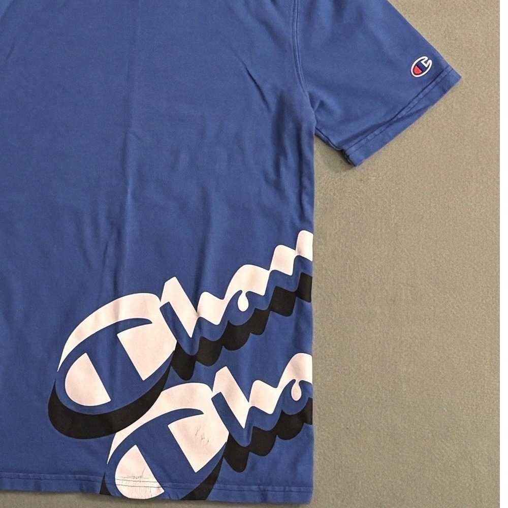 VTG Champion Mens Graphic Logo T-Shirt Blue Small All-Over Wrap Around Print‎